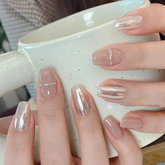 Mẫu nail mắt mèo nâu phù hợp với mọi tông da
