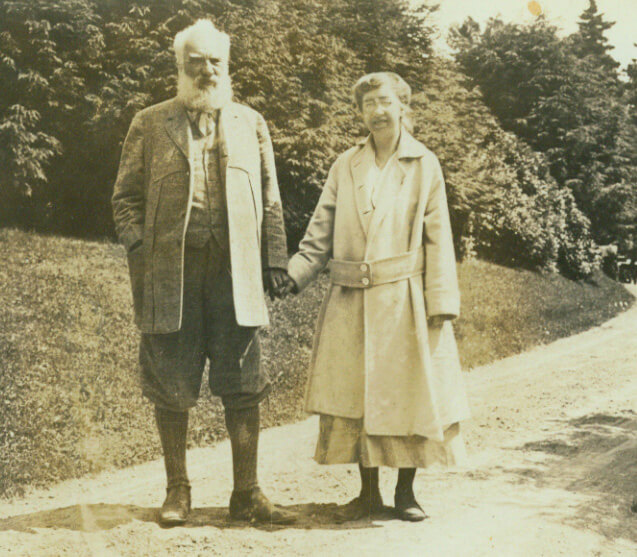A man and a woman hold hands.