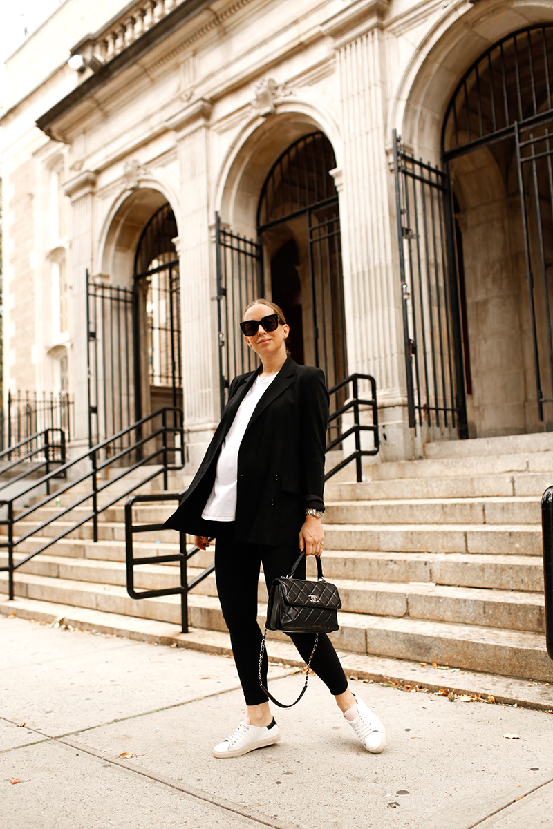 woman posing outside a building