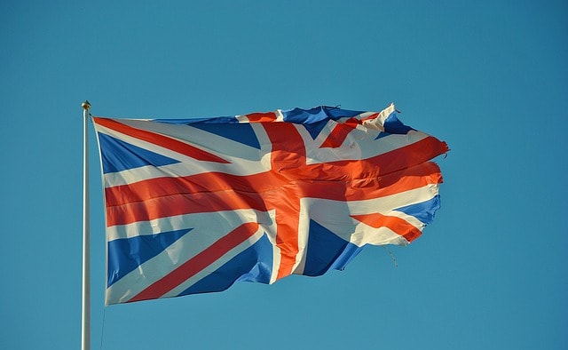 A british flag on a mast .