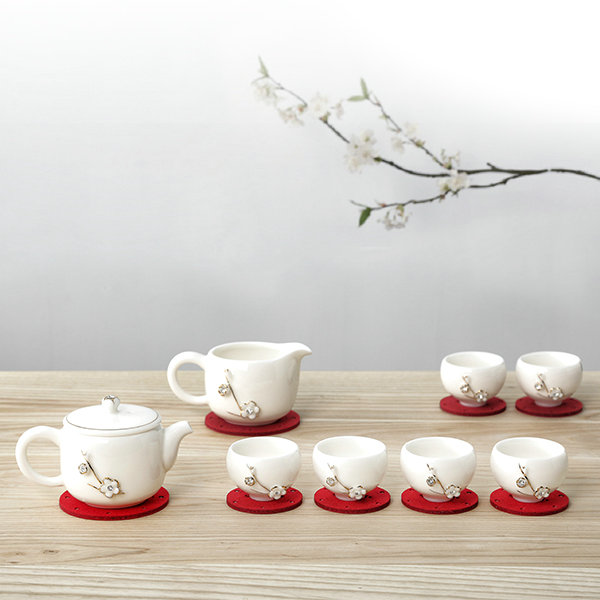 Quà tặng mừng thọ ý nghĩa- bộ bình trà sứ hoa mai