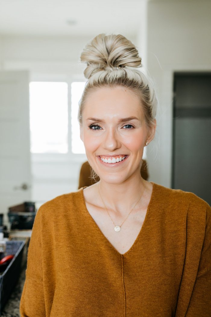 NAKED Palette Tutorial featured by top US beauty blog A Slice of Style; Image of woman in mustard sweater, applying eye shadow.