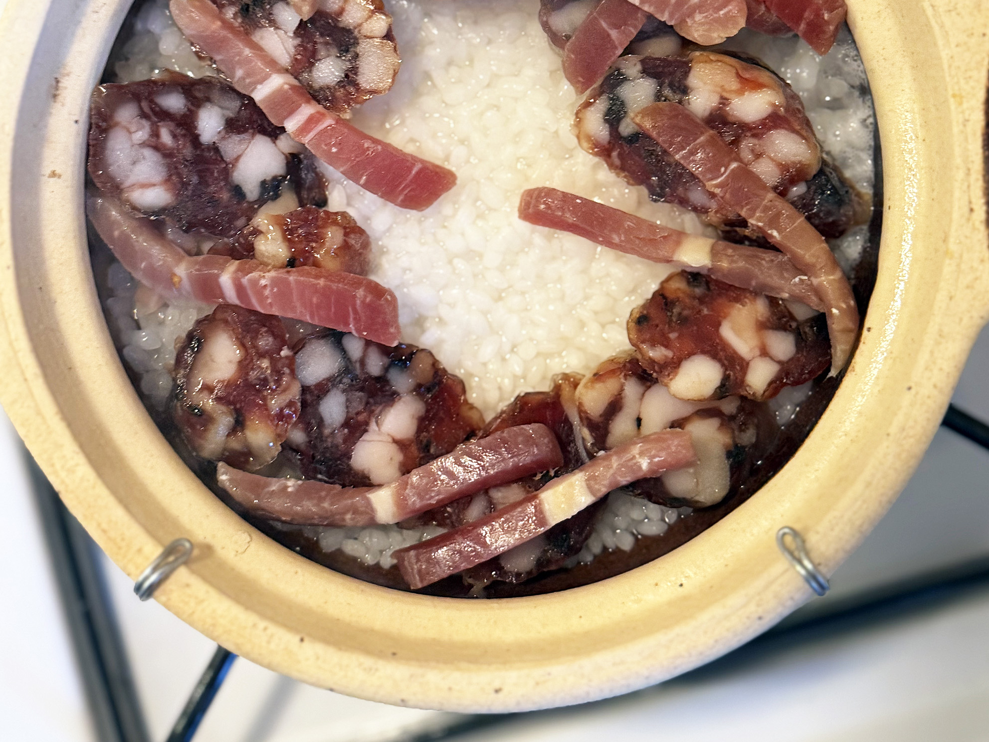 adding toppings for bo zai fan