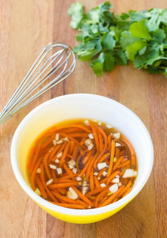 Bowl filled with dressing.